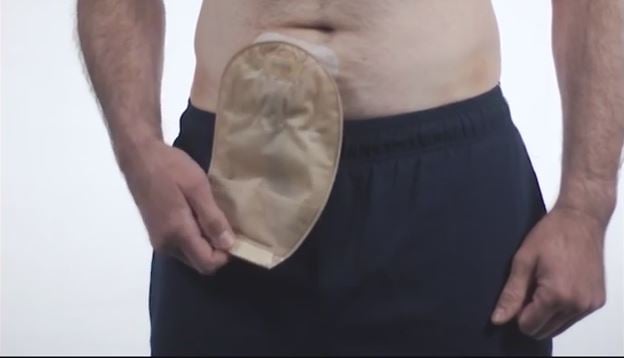 a man with a tattoo on his chest